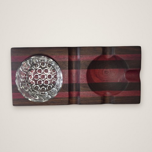 Top view of the striped walnut and purpleheart cigar tray with the rocks glass in its recessed well 