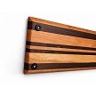Edge detail of cherry and Peruvian walnut striped whiskey tray 