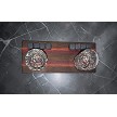 Top view of the striped whiskey tray set with 2 rocks glasses and 8 whiskey stones on a black marble counter 